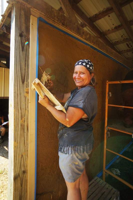 Woman Smiling & Working